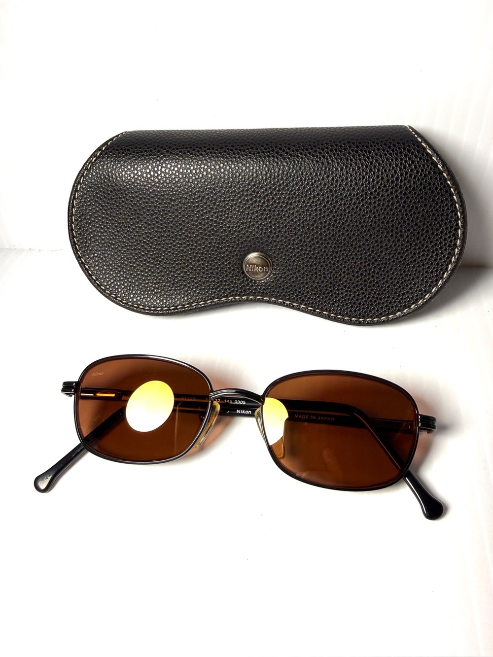 Nikon Black Frame Sunglasses with Brown Glass Lenses and Black Case